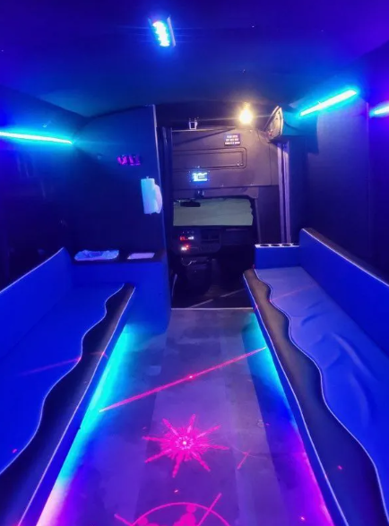Blue san antonio party bus inside view lights on