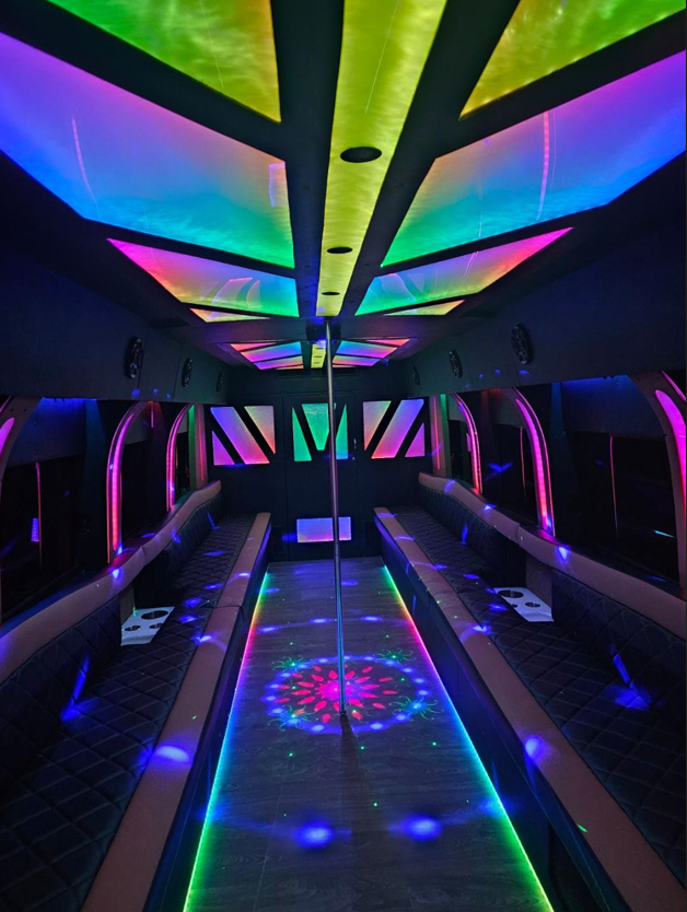 D Lux Party Bus San Antonio inside view lights on night